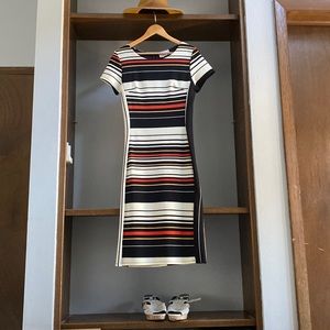 Boutique dress- form fitting, like new. Size large